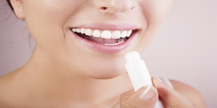 woman lip balm